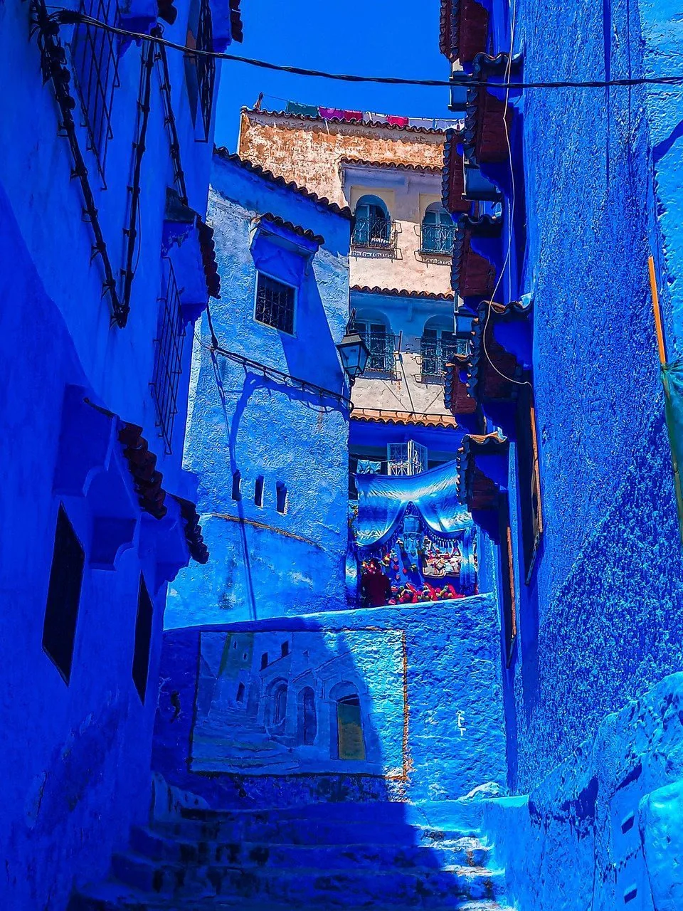 Blue painted stairs alley Chefchaouen
